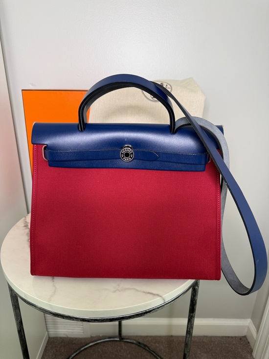 Hermes Handbags - Hermes Red Canvas Shoulder Bag with Navy Leather Trim